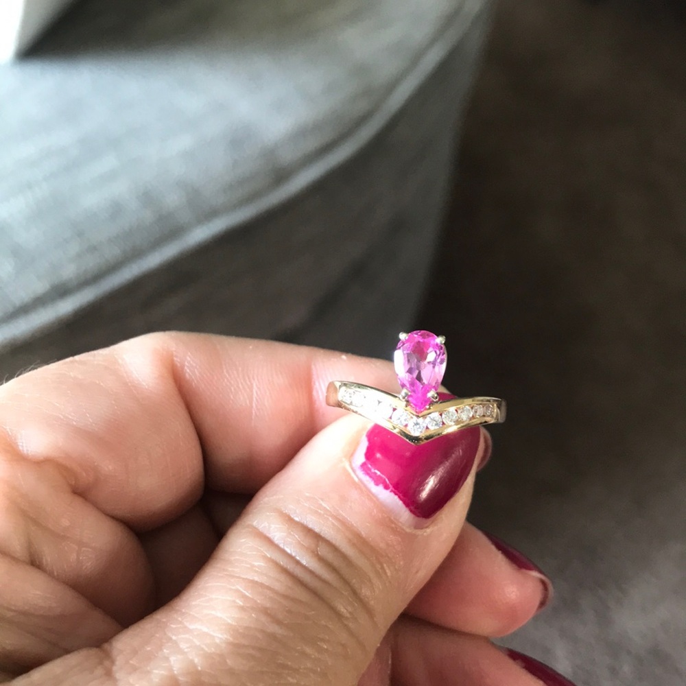 Pink sapphire and diamond ring